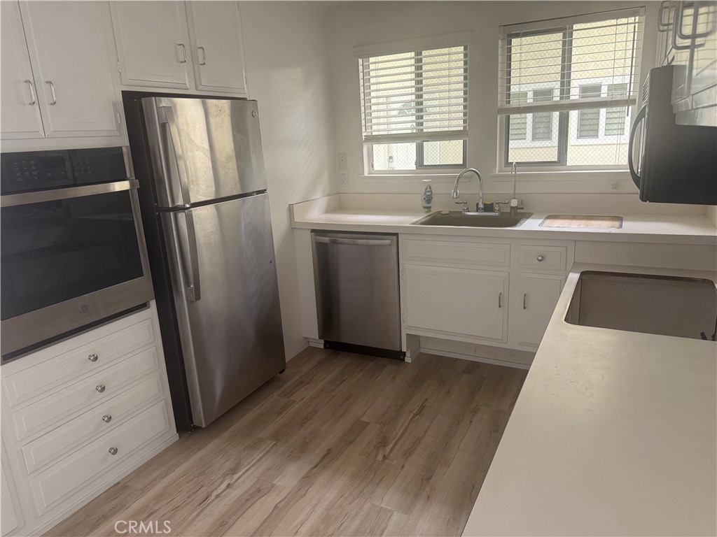 This upper unit has views of Saddleback Mountains, the unit has 2 bedrooms, 2 baths and all of the following is NEW; carpet, flooring in kitchen, oven, refrigerator, dishwasher all stainless steel plus newer large quality washer/dryer inside master bathroom. This unit has a great cross breeze
