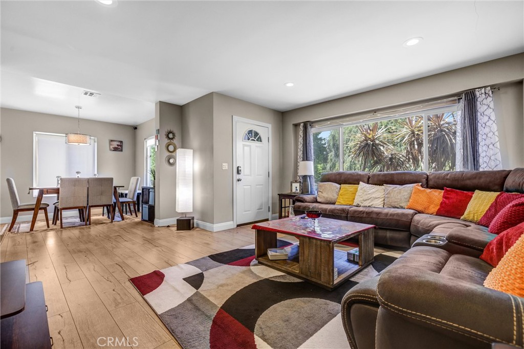 Beautifully updated 3 bedroom 2 bathroom Home with 1,246 Sqft. of living space in a Prime Encino! Tucked away on a quiet cul-de-sac in one of the Encino's most desirable neighborhoods, this stunning home blends modern elegance with comfort and functionality. The open floor concept welcomes you with bright, airy living spaces, enhanced by recessed lightings, and large windows that fill the home with natural light. The gourmet kitchen is a true showpiece featuring sleek quartz countertops, stainless steel appliances, custom cabinetry, perfect for cooking, entertaining, and family gatherings. The primary suite beautifully updated en-suite bathroom, while two additional bedrooms provide ample space for family, guests, or a home office. Both bathrooms have been tastefully remodeled with contemporary finishes, and the home features updated flooring, and thoughtful details throughout including the indoor washer and dryer unit. Step outside to a beautifully updated pergola with a freshly poured concrete floor, creating an inviting space for relaxing, entertaining, dining, gardening, hosting your ideal outdoor gathering, or just relaxing by the fire pit! Located minutes from top rated schools, shopping, dining, and easy freeway access, this home offers the perfect blend of privacy style, and convenience.
