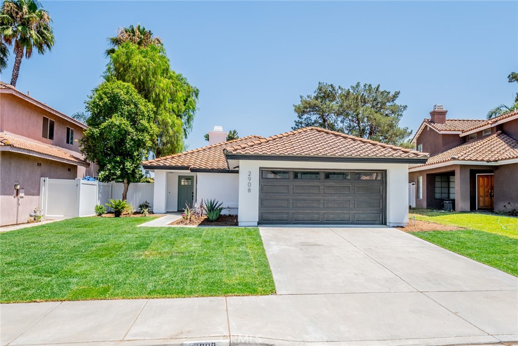 Welcome to this stunning single-story home in the heart of Corona! Thoughtfully upgraded and designed with style and comfort in mind and a move-in ready experience: This home is perfect for creating cherished memories. Inside, you’ll find three spacious bedrooms and two bathrooms on a generous 5,633 sq. ft. lot. The family room features a cozy fireplace with a modern tile surrounding abundant natural light. Upgrades include new laminate wood flooring, plush carpet in the bedrooms. for a contemporary touch. fresh interior and exterior paint, and new ceiling fans with recessed lighting. Bathrooms updated with new vanities quartz countertops shower tiles for a contemporary touch .The updated kitchen is a true highlight with newly painted cabinets, quartz countertops, a stylish backsplash, and all-new stainless steel appliances, sink, and fixtures—perfect for any home chef.Enjoy the newly landscaped front and backyard, ideal for relaxing, entertaining, or weekend barbecues. Attached 2 car garage . Close to the shopping center , Tyler mall, Hospital, School, Hidden Valley Golf Club, Park, and 91 and 15 Freeway..