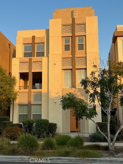 Meet most desirable, 2089 sq.ft., 3-story, 4 bedrooms, 3.5 baths detached home in the Parasol Park, Irvine. Stylish interiors, a downstairs bedroom with full bathroom, bright and airy open floor plan in main level, features modern kitchen with granite counter and full backsplash, stainless steel sinks, Whirlpool built-In appliances, huge center island and White Shaker Thermofoil cabinetry, LED lighting throughout and two wine fridges amenities for entertain. Living Smart home technology with energy saving Tankless water heater, the automation of light switches. Ceramic tile flooring in entry, kitchen, bathrooms, and laundry room. Unique 3 car parking spaces: two in garage and one adjacent to the property. Newly installed carpets and walls paint all over the house. Attend award-winning Irvine Unified School District from grade K to 12. Discover outdoor by access nearby Pavilion and Beacon Parks as well as Orange County Great Park full range exciting amenities like resort style pools and spas, sport courts, BBQs, outdoor kitchens, club houses, green houses, herbal garden, giant chess set and an arts & craft center. Easy access to shopping, freeways and restaurants. It's a must see! Non-smokers only. No Pet.