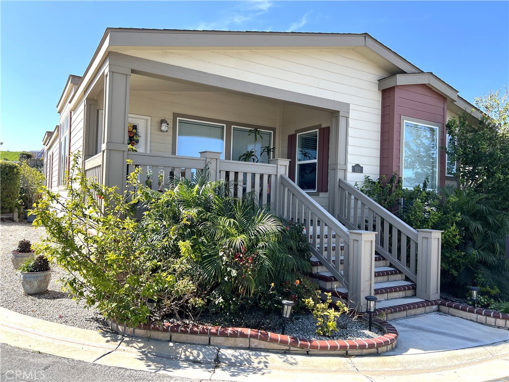 FANTASTIC OPPORTUNITY to own a NEWER BEAUTIFUL THREE BEDROOM home in Torrance. This exquisite home sits on a large corner lot in desirable Skyline Mobile Home Park. When you enter onto the the charming front porch, the first thing you notice is the peek-a- boo view. You open the door and enter into the spacious, open and bright floor plan. The home features a large kitchen island, lots of large windows throughout, stainless steel appliances, laminate flooring, Corian counter tops, recessed LED lights throughout and state of the art washer/dryer. Master bathroom features walk in shower with glass doors. Many upgrades such as ceiling fans in all rooms, extra large utility room, The home is lusciously landscaped with lots of privacy. The carport can accommodate three cars and has an extra large custom shed. Skyline MHP offers many amenities such as a community room, recreation center with pool, jacuzzi, billiard room with pool tables and lots of activities. You are within walking distance of the Rolling Hills Plaza which includes Whole Foods, Trader Joe's, banks, Starbucks and AMC Theater. Enjoy the beautiful south bay evenings from either your front porch or the private back porch.