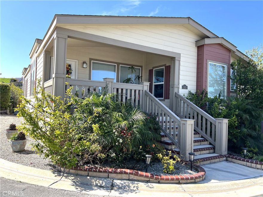 FANTASTIC OPPORTUNITY to own a NEWER BEAUTIFUL THREE BEDROOM home in Torrance.  This exquisite home sits  on a large corner lot in desirable Skyline Mobile Home Park.   When you enter onto the the charming  front porch, the first thing you notice is the peek-a- boo view. You open the door and enter into the spacious, open and bright floor plan. The home features a large kitchen island, lots of large windows throughout, stainless steel appliances, laminate flooring, Corian counter tops, recessed LED lights throughout and state of the art washer/dryer. Master bathroom features walk in shower with glass doors. Many upgrades such as ceiling fans in all rooms, extra large utility room,  The home is lusciously landscaped with lots of privacy.  The carport can accommodate three cars and has an extra large custom shed.  Skyline MHP offers many amenities such as a community room, recreation center with pool, jacuzzi,  billiard room with pool tables and lots of activities.  You are within walking distance of the Rolling Hills Plaza which includes Whole Foods, Trader Joe's, banks, Starbucks and AMC Theater.  Enjoy the beautiful south bay evenings from either your front porch or the private back porch.