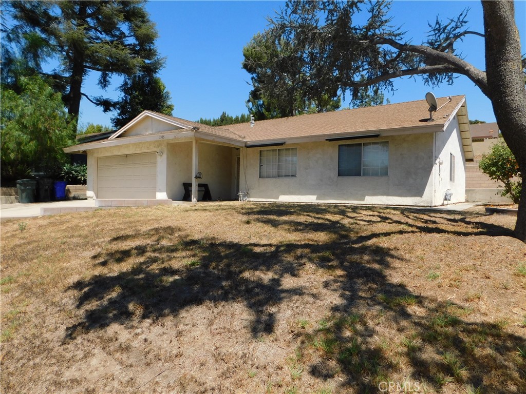 ~BEAUTIFUL 4 BEDROOM WITH ENDLESS PARK VIEWS LOCATED DIRECTLY ACROSS THE STREET FROM RED HILL COMMUNITY PARK~FEATURES INCLUDE NEW COMP SHINGLE ROOF IN 2010, BRAND NEW CARPETING IN LIVING ROOM AND BEDROOMS IN JULY 2025~LARGE LIVING ROOM WITH FIREPLACE AND SLIDER DOOR TO ACCESS BACK YARD~SPACIOUS KITCHEN WITH UPGRADED CABINETS AND PANTRY PLUS VINTAGE STOVE~FULL SIZE DINING ROOM WITH CEILING FAN~PRIMARY BEDROOM IS KING SIZE WITH MIRRORED CLOSET DOORS~PRIMARY BATHROOM FEATURES WALK-IN SHOWER WITH ENCLOSURE~BEDROOMS 2 & 3 ARE FULL SIZE~4TH BEDROOM HAS DOUBLE DOOR ENTRY WITH PARK VIEWS...WOULD BE PEFECT FOR AN OFFICE~HALL BATHROOM FEATURES TUB/SHOWER WITH ENCLOSURE~ATTACHED 2 CAR GARAGE WITH WASHER/DRYER HOOK-UPS~LOW MAINTENANCE BACK YARD WITH TERRACED BLOCK WALL DESIGNED FOR PLANTING A GARDEN PLUS FRUIT TREES, SPACIOUS SIDE YARD WITH ORANGE TREE~***CALL FOR A TOUR***SHOPPING IS RIGHT AROUND THE CORNER AND ALTA LOMA HIGH SCHOOL IS AT THE END OF THE STREET***