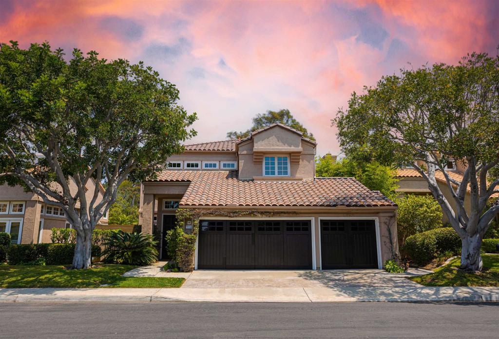 Nestled in the exclusive gated community of Fairbanks Polo Club, this stunning cul-de-sac home offers an exceptional blend of privacy, sophistication & coastal contemporary living. Meticulously updated with a Brand-New Roof, tile & chimney caps, this detached home offers turnkey appeal & lasting value. Step inside to discover soaring 10-foot ceilings, wide-plank European white oak engineered wood flooring & elegant solid wood garage doors. Milgard low-e casement windows & French doors fill the home with natural light, complemented by 3 fireplaces, LED lighting, and a newer dual-zone HVAC system. The custom chef’s kitchen is a true centerpiece, boasting double-stacked cabinetry, granite countertops & premium stainless steel appliances. It flows effortlessly into a spacious family room, formal living room & dining area—ideal for both intimate gatherings & large-scale entertaining. Retreat to the expansive primary suite, complete with a cozy sitting area, custom fireplace & a luxurious ensuite bath featuring a soaking tub, walk-in shower & dual walk-in closets. Step outside to a private backyard oasis, framed by mature trees & serene mountain views. A stamped wrap-around concrete patio, professional landscape lighting & a tranquil fountain create the perfect setting for outdoor entertaining. Additional highlights include an Owned Solar System, 3-Car Garage w/ epoxy floors, and a 220V Bosch EV charger. Resort-style amenities are just steps away, including a pool, spa, tennis & pickleball courts. Prime Del Mar location—minutes to top schools, beaches, shopping, dining, and golf!