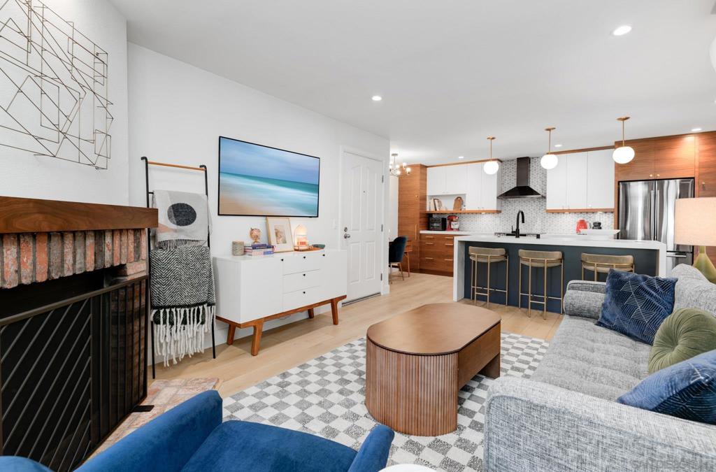 Welcome to this beautifully renovated condo in the highly sought-after Pacific Pines community in Encinitas! This stunning one-bedroom condo has been fully remodeled with high end upgrades throughout. The open-concept design showcases a modern kitchen with a large quartz island (with outlets), quartz countertops, custom designer cabinets, stylish backsplash, new appliances, upgraded lighting fixtures and hardware. Luxury vinyl flooring runs throughout, and the bathroom has been tastefully redone. Additional highlights include washer/dryer, custom built-ins in the walk-in closet, and a mini-split AC systems in the living room and bedroom for year-round comfort. Sound insulation has also been added to the ceiling and walls, creating a peaceful retreat. A charming fireplace and private patio complete a cozy, welcoming feel. Storage and one assigned parking space are also included. Residents of Pacific Pines enjoy an impressive array of amenities: tennis courts, pool, spa, fitness center, racquetball, pickleball and volleyball courts, guest parking, EV charging stations, and scenic nature trails. The location offers easy access to Cardiff, MiraCosta College, beaches, freeway access, and all the vibrant coastal lifestyle Encinitas has to offer. Don’t miss the chance to own this special gem in one of the most desirable coastal communities!