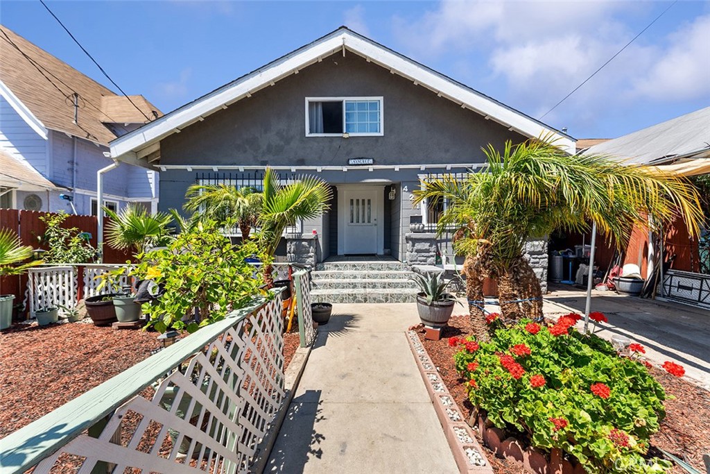 What an amazing find in South Los Angeles!! This remodeled home features 2 Bedrooms, 1 Bathroom, plenty of room for everyone, charm galore with a decorative fireplace and coffered ceiling in the kitchen, bonus attic space for possible bedrooms and/or den/office space. Two wonderful patio areas complete the experience with one beautifully landscaped, BBQ area out front and one covered concrete patio out back perfect for gathering with family and friends. You won't want to miss an opportunity to see this lovely home conveniently located south of Exposition Park, BMO Stadium, nearby 110 Freeway access for easy commute North to downtown Los Angeles or South to Long Beach, shopping, grocery markets, entertainment, restaurants, and so much more! Make your appointment today!