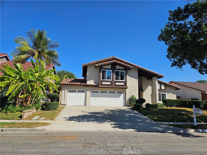 Welcome to this bright and airy two-story home, ideally located in one of Fullerton's most sought-after communities "Fullerton Crest". This beautifully maintained residence features all new double pane windows and sliding doors, fresh interior paint, new recessed lighting and combination of wood, tile and Berber carpet flooring throughout. The main level offers a spacious living room with soaring cathedral ceilings, separate formal dining room and a family room with a cozy fireplace that overlooks the peaceful backyard. The modern kitchen boasts maple cabinets and granite countertops, center island with built-in cooktop and oven perfect for both everyday living and entertaining. A convenient downstairs bedroom and full bathroom are ideal for guests. Upstairs, the huge master suite includes a retreat area, walk-in Closet and a luxurious ensuite bathroom with dual sinks, separate bathtub and shower. Two additional spacious bedrooms and hallway linen cabinets provide comfort and convenience for the whole family. Additional features include 3 car attached garage and separate laundry room. located near top-rated award winning schools, as well as shopping centers, parks, restaurants, golf courses and many more... Don't miss this amazing home!