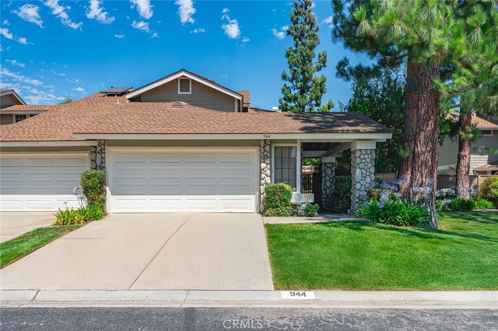 This 3 Bedroom, 3 Bath home is in the very desirable Village At San Dimas. As you come up to the home you enter a private security gate. This leads to the backyard area or the front door. Upon entering the home you will find a dining area and a living room with a cozy fireplace. There is a slider leading to the backyard. Kitchen is large, with lots of cabinets and also has a slider leading to the back yard. There is one bedroom downstairs which has been converted to an office but could easily be converted back to a bedroom. It would be great for in-laws or someone that didn't do stairs well because there is a full bath right next to it. There is also a laundry/utility room downstairs leading to the attached garage. Upstairs you will find 2 additional bedrooms. Master has its own bathroom and tons of closet space. There is another full bath in the hall, making a total of 3 bathrooms. Owner has recently had a new HVAC system put it and has also had the home totally re-piped with PEX piping. Backyard has a covered patio and is very private. There is actually a large side area plus a back area making it extremely large for the complex. Home is in need of cosmetic work but is priced accordingly. This property is in a very desirable, tucked away part of the complex. Amenities for "The Village" include 2 pool / spa areas (with restrooms), a sport court, club house, a playground for the kids and plenty of beautiful sidewalks and greenery throughout the complex. Property is a PUD so financing is easy! This is a wonderful place to take walks, walk your dog, swim or sit out on your patio and just enjoy life. This home is located in the very desirable Bonita School District and is close to parks, shopping, restaurants, schools, walking trails, Bonelli Park, Raging Waters, Citrus College, Mt. Sac, Claremont Colleges and has great freeway access. Don't miss out on this one!!