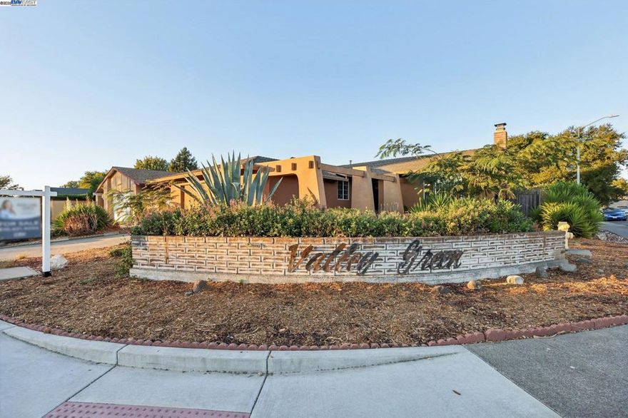 Welcome to this charming single-story 3 bedroom 2 bathroom home, perfectly nestled on a spacious 6,534 sqft corner lot in the highly desirable Valley Green neighborhood. Offering 1,380 sqft of seamless living space, this home boasts fresh interior paint, a newly remodeled bathroom, and an upgraded electrical box for added peace of mind. The inviting living room, complete with a cozy fireplace, provides the perfect setting for relaxation and entertainment. Enjoy a fresh cup of coffee in the bonus sunroom right off the kitchen!  Recent upgrades include the removal of popcorn ceilings, updated hardwood and tile flooring throughout, and a modern water heater. Enjoy the convenience of central heat, ensuring year-round comfort. The home also features a 2-car garage and sits just 10 minutes from downtown Petaluma, where dining, shopping, and entertainment await.