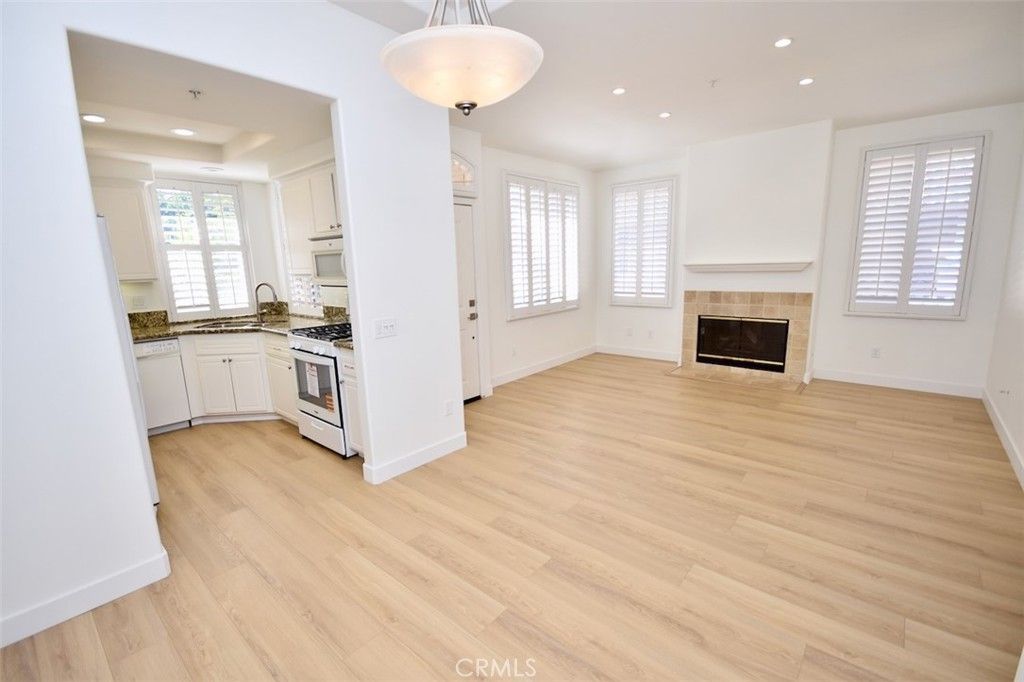 Photo of 405 Tropea Aisle, Irvine, CA 92606 (MLS # OC25272988)