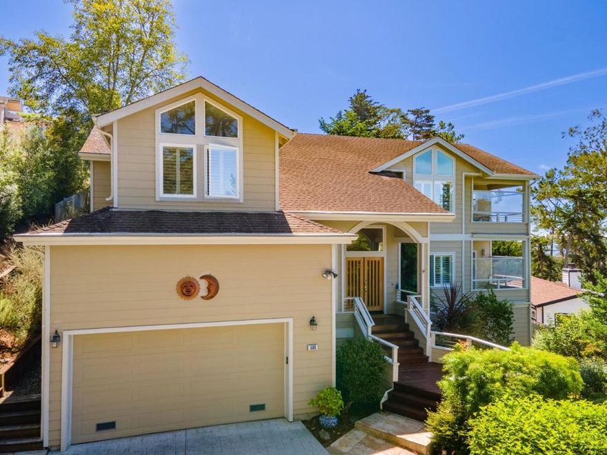 New Price! 3,564sf contemporary home w/ OCEAN VIEWS and LEGAL INI-LAW offering beautifully crafted living space, designed to provide comfort and elegance in equal measure. Features 4 bedrooms and 3 1/2 bathrooms, providing ample space for everyone. Stunning formal living room w/ vaulted ceilings, fireplace and access to the rear yard. The kitchen is equipped w/ modern amenities that cater to culinary enthusiasts w/ island with stainless steel down-draft range, built-in oven and microwave, and refrigerator. The kitchen family room combo is ideal for entertaining while a more elegant dining room is adjacent to the kitchen. Retreat to the primary bedroom w/ access to the rear yard, fireplace and extra large walk-in closet. The large primary bathroom includes a stand-in shower, dual vanities and oversized tub. Located on the downstairs level is an office and spacious rumpus room that could be used as a play room, media room, or bedroom. Also on the lower level is an approximate 600sf, 1 bedroom/1 bathroom, fully self contained ADU with separate entrance. The exterior of the home has decks off of each of the doors to the house and the luscious landscaping is on a timed irrigation system. Best of all, there are even some ocean views from a few rooms. Coastal Living at its finest!