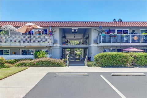 Photo of 654 Avenida Sevilla #A, Laguna Woods, CA 92637 (MLS # OC26131704)
