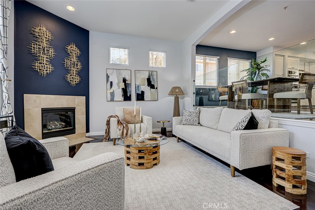 This spectacular 3 bedroom, 2.5 bath end-unit townhome has been immaculately maintained and features a highly desirable traditional floor plan, with all bedrooms located upstairs and the main living areas on the entry level. The inviting, open great room boasts a cozy decorative fireplace, soaring vaulted ceilings, and plenty of natural light. It seamlessly connects to the formal dining area and an expansive kitchen, which features high-end Quartz countertops, elegant Shaker-style cabinetry, stainless steel appliances, and a large center island with breakfast bar, and cozy breakfast nook.
The spacious primary suite is a true retreat, offering a walk-in closet as well as a traditional wardrobe closet, providing ample storage. The primary bath features dual sink granite countertops, a separate soaking tub, and a glass-enclosed shower, making it the perfect place to unwind after a long day. Also on this floor are two generously sized guest bedrooms along with a full bath. Additional upgrades include a newer A/C unit, hardwood flooring, new carpet, recessed lighting, and vaulted ceilings. For added bonus space, an extra-large 14’ deep x 21'6" wide bonus room—approximately 302 extra square feet not included in the listed square footage—offers a versatile media and entertainment room, perfect for family fun or as a private sanctuary. If that's not enough, the private enclosed front yard patio is ideal for year-round indoor/outdoor living and entertaining. Whether it’s hosting friends or enjoying a quiet evening, this space provides a wonderful extension of your home. The spacious, attached 2-car garage features direct interior access, making it convenient for everyday use. Located in a peaceful family neighborhood, this home offers easy access to award-winning schools, a variety of shops, top-tier restaurants, freeways, and is just minutes from the beach. This location is truly one of Redondo’s best-kept secrets—what more could you ask for?