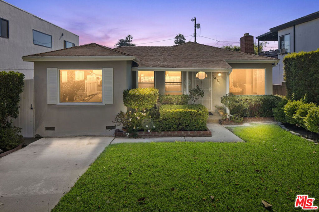 On the market for the first time in years, this delightful 2-bedroom, 1-bath home pairs timeless charm with endless potential. Set behind a white picket fence with lush green grass and a beautiful shade tree, the property has been lovingly maintained and offers a welcoming first impression.Inside, the home is filled with warmth and character, ready to enjoy as-is or reimagine to fit your vision. The detached garage easily accessed from the alley adds convenience rarely found in the neighborhood. Located just steps from the newly beloved Beethoven Market and other local favorites, the setting is both walkable and vibrant. Whether you're looking for a fantastic starter home or a canvas for your dream renovation, this property is a wonderful opportunity in a sought-after community. Property has been virtually staged.