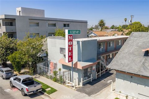 Photo of 451 E Vernon Ave, Los Angeles, CA 90011 (MLS # RS26066273)