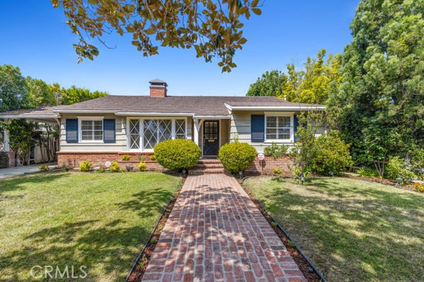 Storybook Sherman Oaks pool home on beautiful tree lined street! Step into timeless style and comfort in this stunning 3-bedroom, 3-bath mid-century home, brimming with character and warmth. From the moment you enter, you’ll be greeted by expansive living spaces with classic architectural lines, rich natural light, and charming period details that blend seamlessly with thoughtful updates. The spacious living room features original design touches and a perfect flow into the dining area, ideal for both intimate gatherings and lively entertaining. The kitchen offers a harmonious mix of vintage charm and modern functionality, complete with generous counter space and storage. Each bedroom is generously sized, with the primary suite boasting a private bath and serene views. Outside, your private backyard oasis awaits—highlighted by a sparkling gated pool, perfect for cooling off on warm days or hosting summer barbecues. Lush landscaping and multiple seating areas create a resort-like atmosphere you’ll never want to leave. The detached garage next to the pool features a bathroom and would make a perfect ADU, gym, family room, etc. Centrally located in a highly sought after neighborhood in Sherman Oaks with nearly renowned restaurants, trendy shops, parks, easy freeway access for commuting this makes the perfect place to call home! This one won't last!