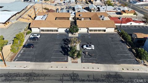 Photo of 309 E Mountain iew St, Barstow, CA 92311 (MLS # HD26072160)