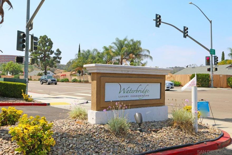 Welcome home. Enjoy the spaciousness of the vaulted ceilings and bright light in this well maintained 3/2 condo corner location, second level. Granite counters and stainless appliances. Stackable Washer/dryer. Private balcony. Upgraded windows and HVAC system. Walk to award winning PUSD.