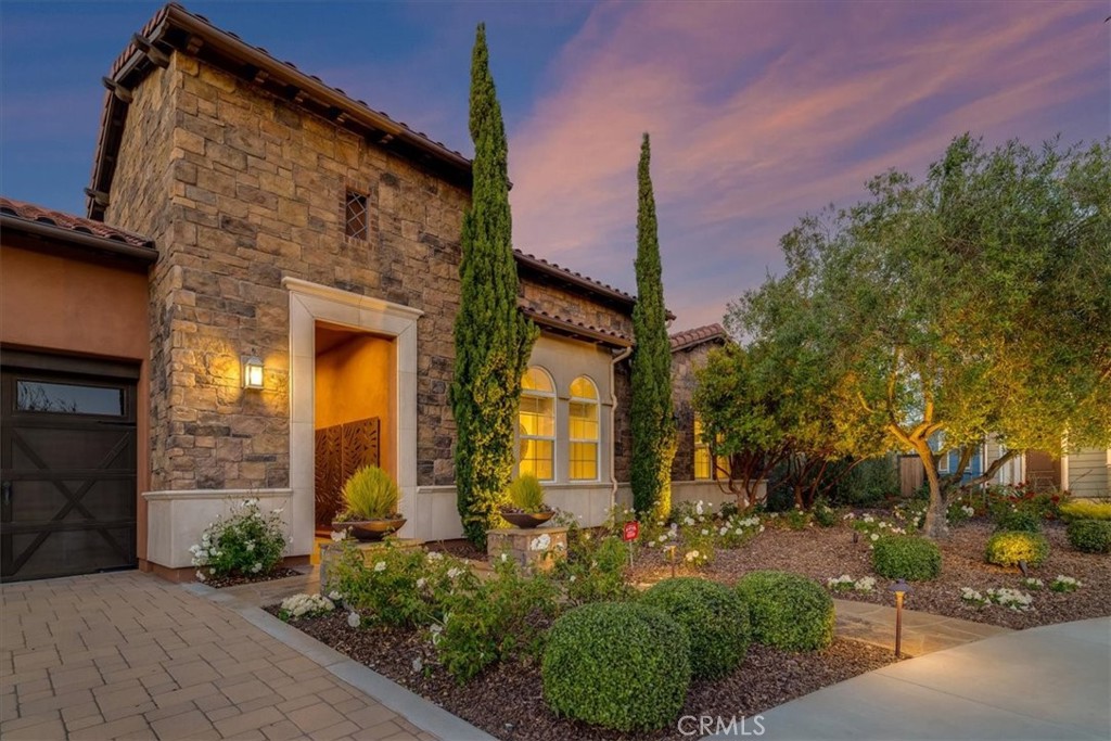 This former Dolcetto model home is brimming with upgrades and custom features, offering the perfect balance of style, comfort, and sophistication. Featuring 3 bedrooms, a versatile den/office, and 3.5 bathrooms including a powder room, the layout is both functional and elegant. Ideally situated above the community, it showcases breathtaking views of the neighborhood, lush trees, vineyard, and surrounding mountains. Inside, every detail has been thoughtfully curated by a professional interior designer, creating a seamless flow of tranquility, elegance, and simplicity throughout. The open and inviting layout makes entertaining effortless while still providing cozy retreats for everyday living. Outdoors, you’ll discover multiple private areas designed for relaxation and peaceful sanctuary, whether you’re enjoying quiet mornings, intimate gatherings, or sunset views. Homes of this caliber are rare—make your move now and don’t wait, or this unique opportunity may pass you by.