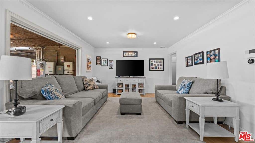 Photo of 6708 E De Leon Street, Long Beach, CA 90815 (MLS # 26864381)