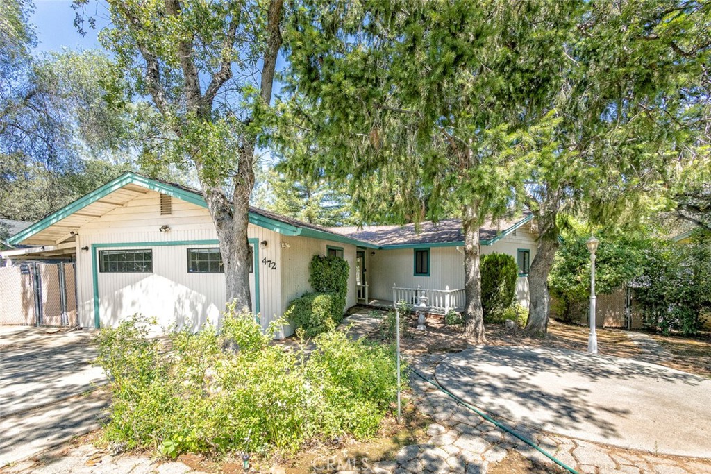 Charming 3-bedroom, 2-bath home located in the desirable Kelly Ridge Estates Owners Association, just minutes from beautiful Lake Oroville, where fishing and boating opportunities are at your backdoor.
Inside, the home features 2 large primaries on each side of the house, with bathrooms attached. And a third bedroom (garage conversion) that could be used as a den or office. The kitchen offers tile counters, a large island, and an abundance of counter space—perfect for meal prep and entertaining. Great decking gives you the outdoor space to BBQ, or relax and enjoy the natural surroundings.
The home also offers an under deck storage area with room for a small work area, giving hobbyists and DIYers a versatile space. With its prime location near Lake Oroville, you’ll have quick access to boating, fishing, hiking, and all the recreational activities the area has to offer.
This property combines comfort, convenience, and a fantastic location—ready for you to make it your own!