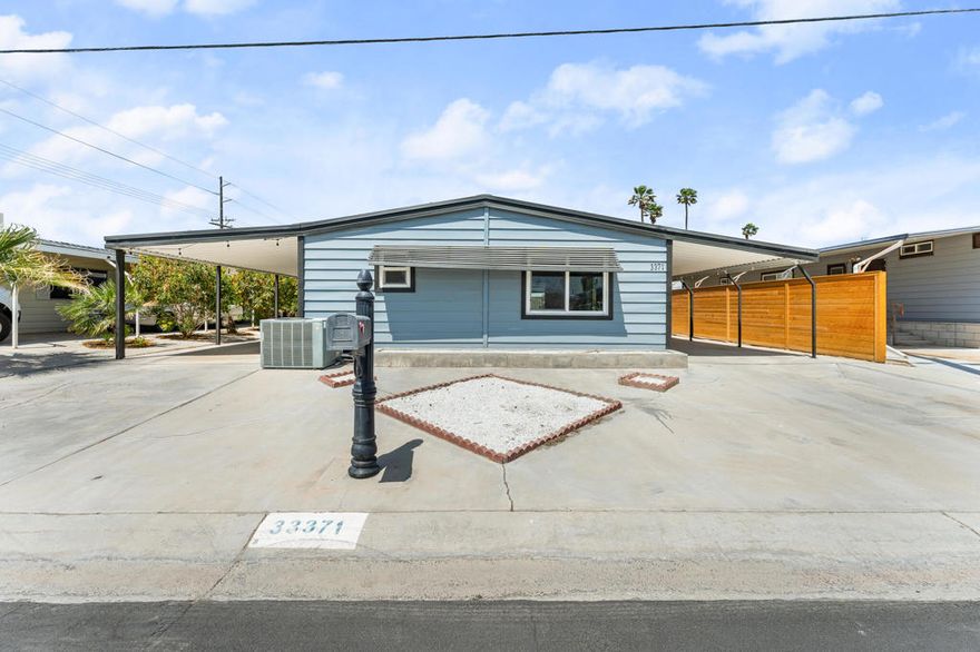 YOU OWN THE LAND, LOW MONTHLY HOA, 55+ COMMUNITY! Don't miss your chance to own this beautifully updated 2 bed, 2 bath home featuring a bright open-concept layout and breathtaking panoramic views of the mountains and golf course. Recently renovated, this home blends modern design with exceptional comfort, it features a brand-new kitchen with elegant quartzite countertops, recessed lighting, an extra-large living room enhanced by picture windows, new flooring, smooth ceilings, and stylishly updated plumbing and lighting fixtures throughout. Seller is open to completing a 433A foundation to allow financing options such as FHA, Conventional, and VA loans, contact me for more info. As a resident of Tri-Palms Estates, enjoy FREE GOLFING and fantastic community amenities including two outdoor pools and spas, well-maintained shuffleboard courts, illuminated tennis courts, and a clubhouse with dining, banquet facilities, and a recreation lounge. Conveniently positioned near the I-10 freeway with quick access to Walmart, Home Depot, Costco, and Sam's Club, you're within 20 minutes of everything the Coachella Valley offers. Plus, being within IID territory means lower electric bills. Don't miss this incredible opportunity--act quickly and make your offer today!