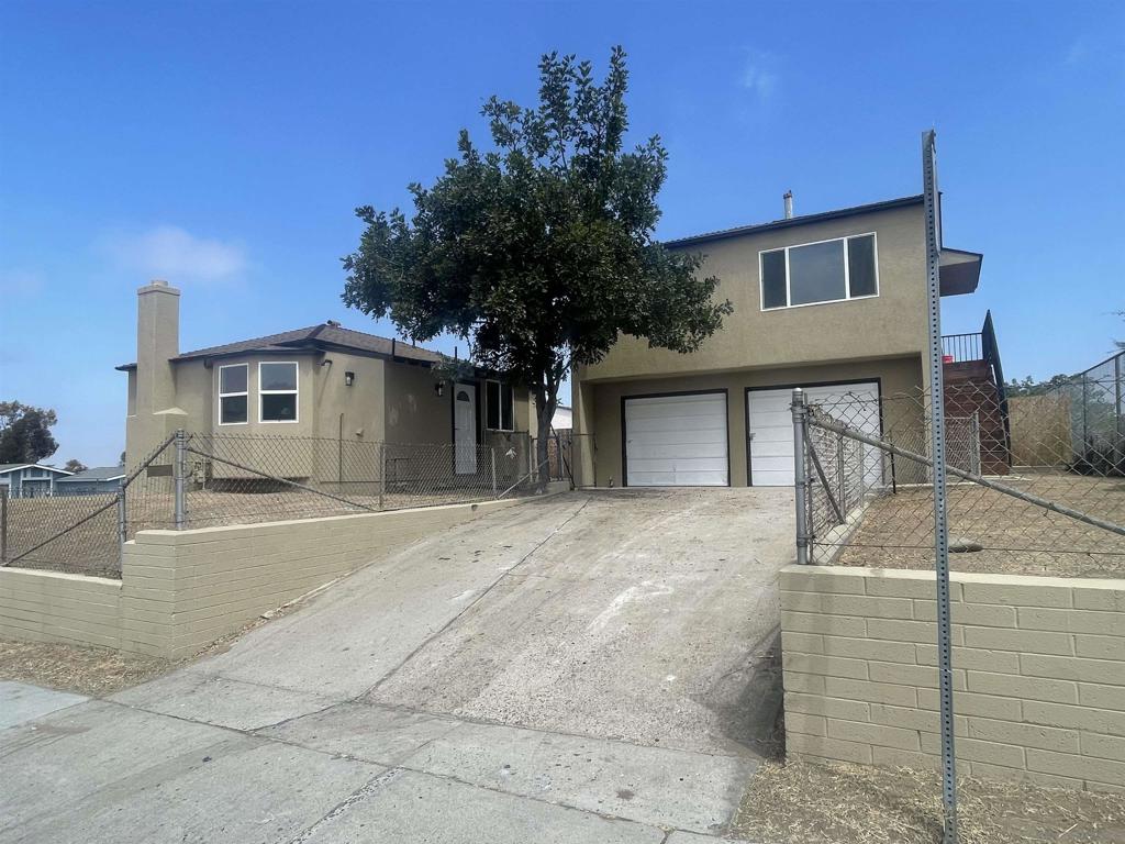 Tri-Plex Investors or Extended Families! Remodeled Duplex, each unit is 2 bedrooms, 1 bath w/ in unit laundry, along w/ plans already submitted to City for a 3rd, 2 bedroom, 1 bath unit via garage conversion to make this a premium tri-plex. Lot zoned R-2 Minor Multiple. Corner lot w/ driveway parking & separate fully fenced yards. Main house is approx 750sf w/ fireplace, separate dining room area & views of Downtown SD skyline from living room area. Both units have brand new windows, doors, flooring, custom tiled showers, ceiling fans, stainless steel appliances, central heating & A/C, cabinets, quartz counters, mirrored closet doors, & new paint inside & out! Only one neighboring home to the north. Property sits up on lot & cozy 2nd story unit has Mountain & Downtown views! Live in one & rent others, invest, or make it a family compound!