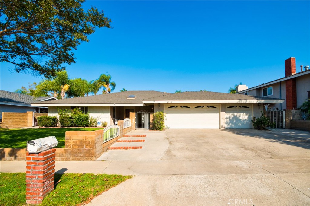 Welcome to Madonna!!!
Situated on a quiet cul-de-sac within a well-established neighborhood, this single-story ranch offers a timeless and highly functional floor plan with room to live, work, and entertain. With 4 bedrooms, 2.5 bathrooms, and an oversized 3-car attached garage, the home spans 2,262 sq.ft. on a generous 9,960 sq.ft. lot—a rare combination of space, privacy, and convenience. Step inside to a welcoming entry that opens to a high-ceiling living room filled with natural light and views of the backyard. Throughout the home, plantation wood shutters on all windows and new recessed lighting in the living and family rooms create a bright yet refined ambiance. The comfortable family room with fireplace and wet bar provides a natural gathering space, while a formal dining area sits just off the kitchen for effortless hosting. The kitchen is filled with natural light from its south-facing bay window and offers ample pantry space, storage, and direct laundry-room access for everyday efficiency. The primary suite is thoughtfully separated for privacy and features a walk-in closet, soaking tub, dual vanities, and serene views of the yard. Three additional bedrooms share a sensible second bathroom with a double-sink vanity and window for natural light, plus a convenient powder room for guests located near the entry. The layout balances comfort and practicality, making it ideal for a variety of lifestyles. Outdoors, the property is equally inviting. The creative front yard playground for kids adds family-friendly charm, while the backyard showcases an elevated lawn, paved patio, and a grass-and-tree garden with rose accents, offering multiple spaces to relax, entertain, or garden. Wide side yards provide flexibility for play, gardening, or extra parking/RV potential, while the oversized 3-car garage ensures plenty of room for vehicles, storage, and hobbies. Located just minutes from Brea Mall, La Habra shopping and dining, golf courses, and parks, the home is also near award-winning Hermosa Elementary School and neighborhood sidewalks that support an active, community-focused lifestyle. This property combines classic design, thoughtful updates, and endless potential—making it a rare Fullerton opportunity.