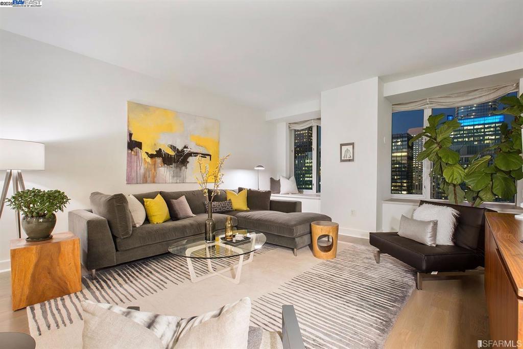 Residence 24F at The St. Regis boasts stunning north- and east-facing views of the San Francisco skyline, Bay Bridge, and waterfront. Wake up to breathtaking sunrises and unwind with the city's twinkling lights. This elegant home features an open floor plan, expansive windows, hardwood floors, and a gourmet kitchen. Two en suite bedrooms offer comfort and privacy. Ideally located near the SF Museum of Modern Art, Yerba Buena Gardens, and premier dining and shopping, The St. Regis provides an unmatched lifestyle with five-star amenities, including a pool, spa, fitness center, yoga room, steam room, sauna, landscaped terrace, and 24-hour private dining. Residents enjoy top-tier services such as a concierge, butler, doorman, porter, engineer, housekeeping, and a Residential Director of Operations, ensuring effortless luxury in the heart of the city. Views: Downtown