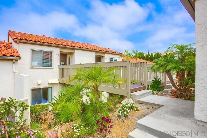 Your Carlsbad condo with peek-a-boo ocean views, modern fixtures and finishes, neutral tones, floor-to-ceiling stone fireplace, lots of natural light and cool breezes. A kitchen with stainless steel appliances, quartz countertops, luxury wood-like vinyl flooring throughout the open living space and to the lower level bedrooms. The large primary bathroom with both a standing shower and separate spacious soaking tub; step out to your deck patio space off the primary bedroom overlooking the parklike greenbelt.  Other amenities include in-unit laundry, detached 1-car garage, and ample parking for a second vehicle and guests; community amenities include common pool & spa, sauna, clubhouse, and scenic walking trails, water usage, hot water included, roof, termite, trash are all covered by the HOA. Just minutes to the beach, shopping, restaurants, parks, Coaster station and excellent I-5 access.   Some photos are virtually staged