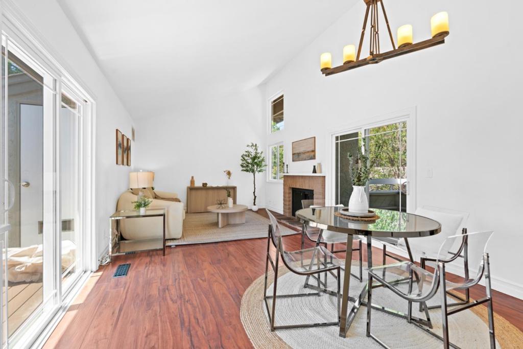 Welcome to 2124 Canoas Garden Ave #2 a bright and inviting townhome-style condo that feels like home the moment you walk in. Step inside and you're greeted by high ceilings and a spacious living room filled with natural light. The kitchen has been beautifully updated with Quartz Venatino Gold countertops that add just the right touch of elegance. Fresh interior paint and a new HVAC system (installed less than a year ago) mean you can move in worry-free. There are two private patios where you can enjoy sunny afternoons, morning coffee, or hangouts with friends. Both bathrooms have been nicely updated with modern touches: new vanities, LED mirrors, stylish vinyl floors, and new toilets. Downstairs, you'll find a generous primary bedroom with a walk-in closet and sliding door to your very own backyard garden. The second bedroom works great as a home office or extra room for guests or family. You'll also have your own garage and carport, plus you're just minutes from downtown Willow Glen, The Plant, Starbucks, and the movies. Come take a look you might just fall in love!