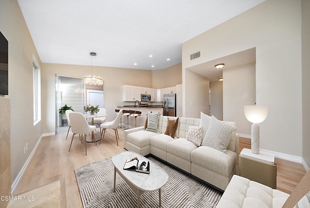 Welcome to your dream condo in the heart of it all!Step into style, comfort, and unbeatable convenience with this beautifully updated 2 bedroom, 1 bath condo located in one of Thousand Oaks' most desirable locations. Just minutes from top-rated restaurants, trendy shops, the Civic Arts Plaza, Gardens of the World, lush parks, award-winning schools, and easy freeway access--this location truly has it all.Inside, you'll be greeted by an abundance of natural light, vaulted ceilings and upscale finishes throughout. The delightful kitchen features crisp white shaker cabinetry, granite countertops, a brand-new stainless steel appliance suite, and a sleek new single basin sink and faucet. Whether you're entertaining or just enjoying a quiet night in, the open-concept living space--with its elegant travertine-clad fireplace--sets the perfect tone.Unwind on your private balcony, accessible from both the living room and the primary suite. Surrounded by mature trees and greenbelt views, the balcony is an ideal spot to enjoy cool summer evenings or peaceful morning coffee. Ample storage is available too!Recent upgrades include stunning wood-like honey oak flooring, baseboards, fresh neutral paint, recessed lighting, plantation shutters, upscale mirrored closet doors, and six-panel interior doors. The spacious bedrooms offer comfort and privacy, while the bathroom is updated and move-in ready. Plus, enjoy the convenience of your own in-unit newer stackable washer and dryer, generous storage, and a newer HVAC system for year-round comfort.Discover the charm and ease of living on ''Pleasant Way''-- vibrant living in one of SoCals most pleasant communities!