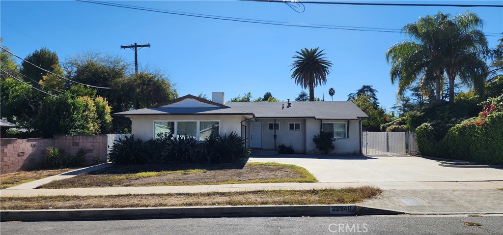 Seize this prime opportunity in Woodland Hills! Located at 22348 Kittridge St, this property offers immense potential for real estate investors seeking value-add prospects in a highly desirable San Fernando Valley neighborhood. This 3-bedroom, 2 bath, 1,440 sf ranch style home with original hardwood floors and updated, dual paned windows, sits on a large 11,840 sf flat, rectangular lot with a large backyard, pool, attached 2-car garage, ample on-site parking, side RV parking, and tremendous ADU Potential. Nestled in a quiet, family-friendly area, this single-family residence is strategically positioned near Warner Center, providing easy access to top-tier dining, shopping, and entertainment, as well as major employment hubs. Sold in As-Is Condition.