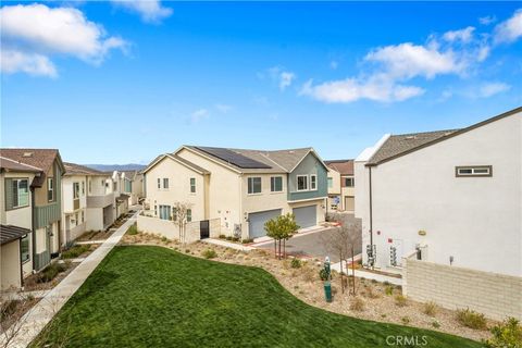 Photo of 27632 Ensemble Place, Valencia, CA 91381 (MLS # SR25075547)