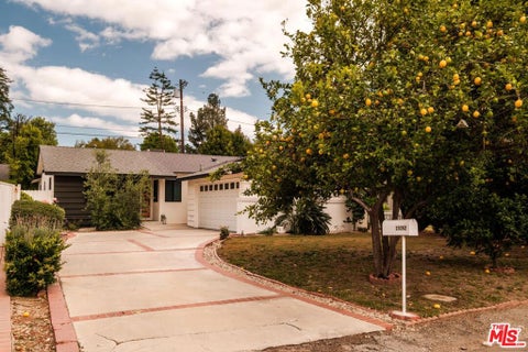 Photo of 23262 Ostronic Drive, Woodland Hills, CA 91367 (MLS # 26828235)
