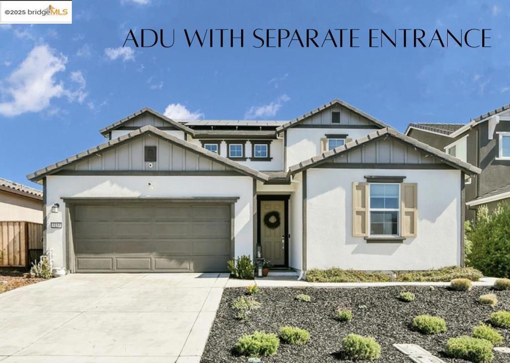 This stunning home with an ADU!!!! Showcases true pride of ownership with no detail left undone. Fully upgraded throughout, it features leased solar panels, beautifully enhanced lime stone fireplace, and stylish upgraded light fixtures. A standout feature is the spacious in-law unit with a private entrance, full kitchen, bedroom, and laundry—perfect for guests or multi-generational living. Upstairs, you’ll find the primary suite, two additional bedrooms, a den, a loft, and a convenient upstairs laundry room. The backyard is ideal for entertaining, complete with a large deck, beautiful landscaping, and a dedicated dog run. Located in a quiet, private neighborhood close to parks, hospitals, shopping, and freeway access—this home truly has it all. Don’t miss the opportunity to make this exceptional property yours!