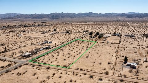 Photo of 64475 Sun Mesa Road, Joshua Tree, CA 92252 (MLS # JT24154385)