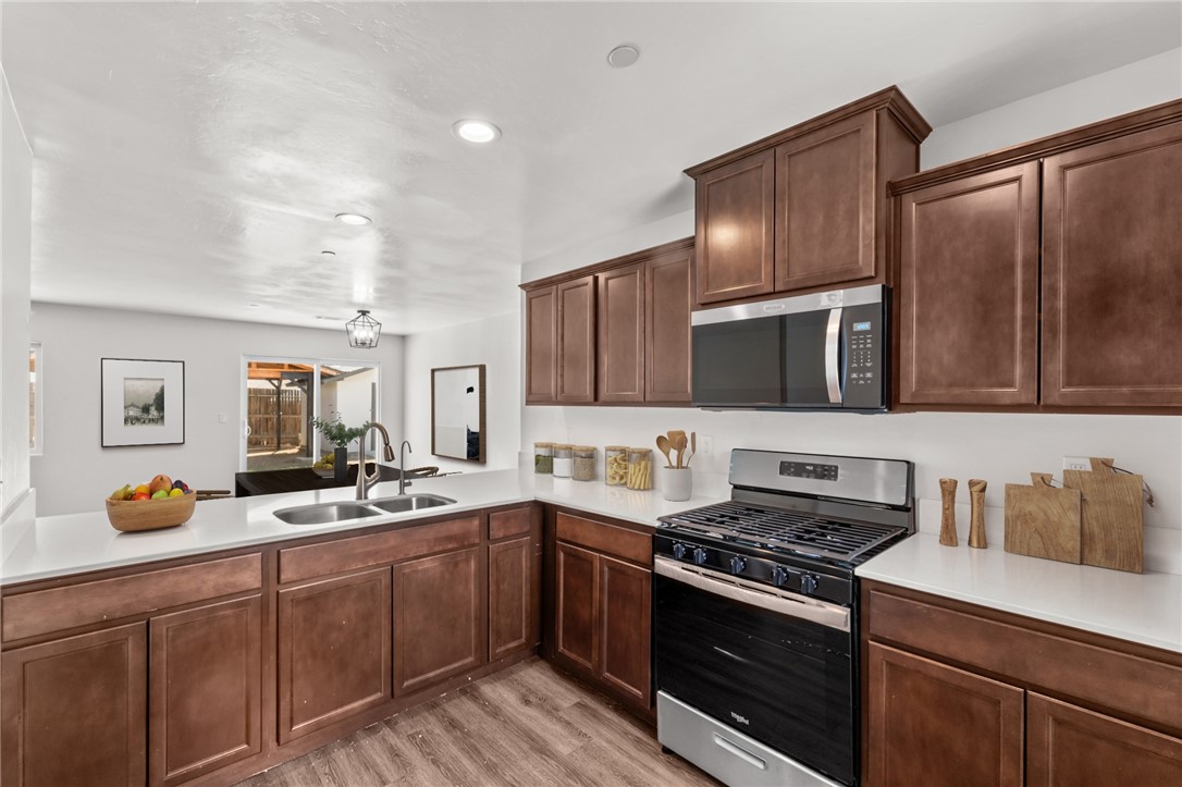 Get ready to dance into your dream home at this charming East Bakersfield gem! Located on the lively and aptly named Cha Cha Court, this 4-bedroom, 2-bath beauty built in 2020 offers a perfect blend of modern style and cozy comfort — all on a spacious 6,534 sq ft lot.
With 1,488 sq ft of living space, the open-concept layout flows like a smooth cha-cha routine — from the welcoming living room to the bright kitchen and out to the sunny backyard, ideal for entertaining or relaxing after a long day.
Whether you're a first-time buyer or an investor looking for great rental potential, this home hits all the right beats. With nearby schools, parks, and shopping, you’ll be perfectly positioned to enjoy everything Bakersfield has to offer.