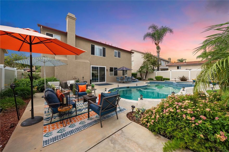 ***POOL HOME IN SOUTH CORONA*** This large home combines spacious living and resort-style outdoor living. With 2,964 sq ft, 5 bedrooms, and 3 bathrooms—including a full bedroom and bath on the main level offering the opportunity for next-gen living. This home is designed for both comfort and flexibility. Step inside to be greeted by an open floor plan with high ceilings and an abundance of natural light. The family room offers a warm, inviting atmosphere with a cozy fireplace, while the open-concept kitchen flows effortlessly into the living and dining areas—perfect for entertaining or family gatherings. Upstairs, you’ll find a spacious loft, ideal for a home office, gym, or playroom. Outside, your private backyard retreat awaits with a sparkling pool and spa, providing the perfect setting for sunny SoCal days and evening get-togethers. Additional features include a three-car garage, RV parking, and a wide driveway with plenty of space for all your toys—boats, trailers, or camper vans. Nestled within the boundaries of the highly rated Corona-Norco Unified School District, this home also offers easy access to the 15 and 91 freeways, local shopping, dining, and entertainment. Offering everything you’ve been searching for—space, style, and location. Don’t miss your chance to make it yours!