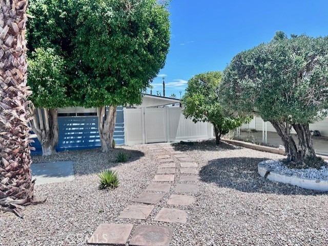 Beautiful home in Date Palm Country Club on the 14th hole of the golf course. Very large kitchen & baths recently updated, granite throughout, Murphy bed in family room, double-entrance guest bath (hallway & 2nd bedroom). Direct in/out golf cart access, garage door opener, plentiful storage. Covered driveway easily holds 2+ cars plus extra parking spot.
This home enjoys a outdoor side patio and both screened-in & open areas w/landscaped large back yard looking onto 14th hole green. Open concept living/dining/kitchen areas have huge views onto the golf course and NE view of the mountains. Morning sunrise is simply gorgeous, looking onto mountains above the 14th fairway. Very nicely shaded South side keeps the home cool and enjoyable.
Very easy access to satellite clubhouse (about 100 ft away!) with heated pool, hot tub, separate men’s/women’s saunas, showers, etc. Very nice, upscale fitness center just steps away. 24-hour access to main swimming pool, hot tub, showers, outdoor pavilion.
Dog Park has 24/7 access, lighted, and across from tennis/pickleball courts. You’ll make many friends with a strong sense of community when you come to the dog park, play pickleball, attend potluck dinners, enjoy free coffee/donuts every Friday, attend community meetings and events, enjoy Citizens on Patrol (very safe environment), and a plethora of other events.
Nick’s Bistro is the on-site restaurant, open to the public, previously Nicolino’s Italian Restaurant across Date Palm. Enjoy special events, live music on weekends, daily dining specials, nice bar area, private parties, catering, trivia night, bingo, and many other events to enjoy the community atmosphere.
Very easy access to nearby rear gate entrance, opening automatically when you smile.
Recent equipment upgrades include HVAC, refrigerator, gas stove, and more. Washer-dryer, evaporative cooler, and doggie door included. Bedroom furnishings included with a full-price offer. Ecobee premium programmable thermostat and digital lock are included.
