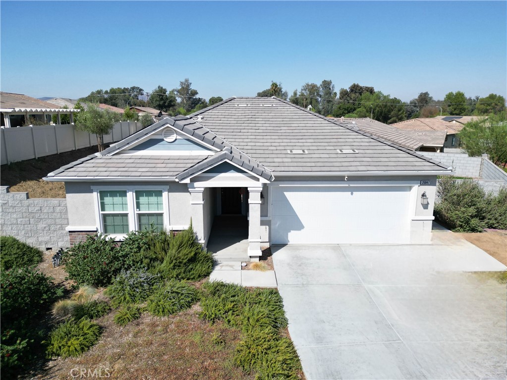 This Beautiful 2021 turnkey home features a spacious open layout, perfect for modern living and entertaining. The beautifully landscaped backyard includes a cozy gas firepit, creating the ideal spot for gatherings. With fully paid solar, this home offers energy efficiency and long-term savings. A premium water softener system adds comfort and convenience to everyday living.