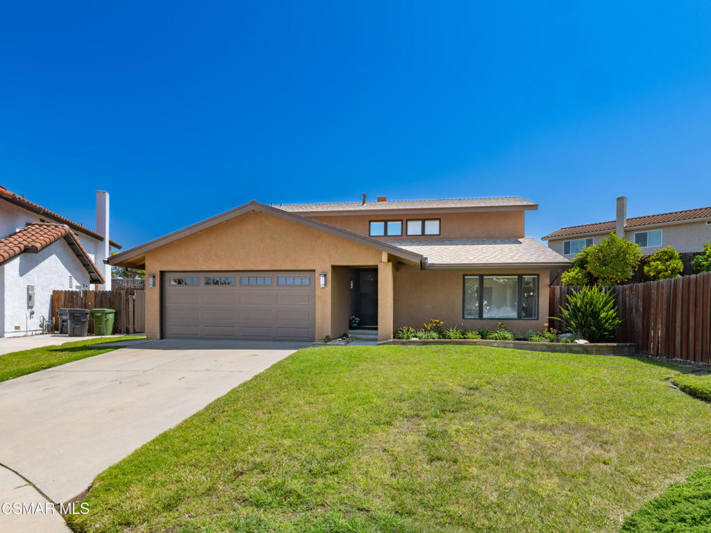 Located in a prime cul-de-sac location in the heart of Moorpark, this light and bright 4-bedroom, 3-bath home offers 1,723 sq. ft. Floorplan is ideal for both entertaining and everyday life. The updated kitchen features maple cabinets, granite countertops, stainless steel appliances (including a refrigerator), and a pantry with pull-out shelves. The kitchen opens to a cozy family room with a fireplace, perfect for entertaining or game nights. Spacious living room connects to dining room which opens to back yard. Downstairs also conveniently has a bedroom with a full bath, perfect for guests or a home office. The primary suite has a walk-in closet, wood-like flooring, ceiling fan, and a vaulted ceiling. En-suite is complete with granite counters and an upgraded tile shower. Jack and Jill bedrooms complete the upstairs. Other amenities include Pella windows, recessed lighting, a new garage door, newer A/C and heating systems, and a newer water heater. The roof was replaced in 2023, and the exterior was painted in 2024. Gutters were replaced in 2024 as well. The expansive private backyard is ideal for entertaining, featuring so many fruit trees, a terraced hillside with pretty plants and flowers, nice garden shed, and a fenced dog run. The extra-large side yard is a perfect space for adding a pool for all of your summer fun, or if you prefer, you can add an ADU! Close to schools, parks, dining, and recreation! AND NO HOA!