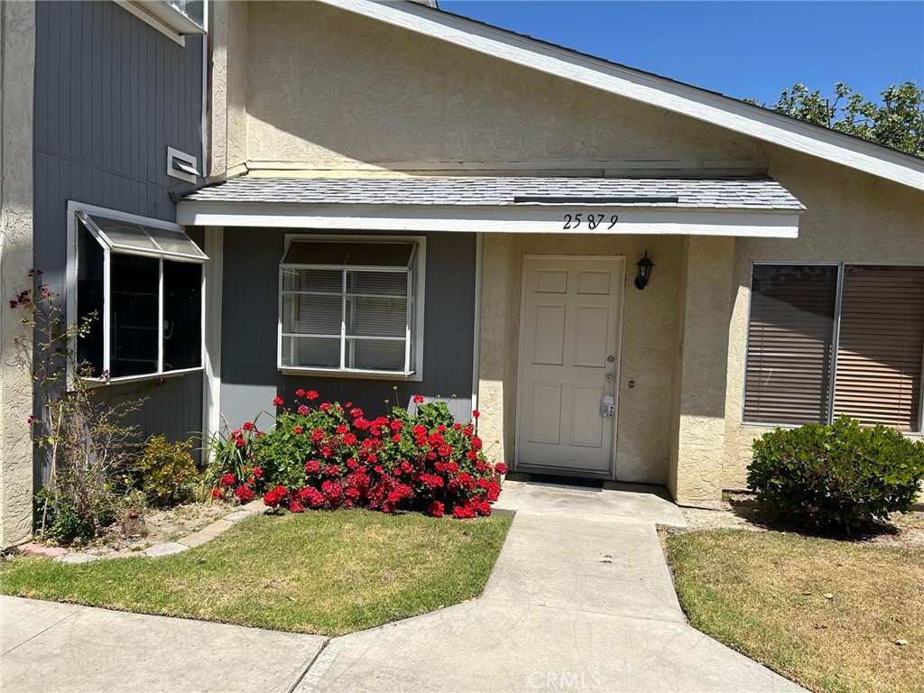 Welcome to 25879 Baylor Way, a delightful and well-maintained end-unit condominium nestled in the highly sought-after Dartmouth Arbors community in East Hemet. This charming single-level home offers the perfect blend of comfort, convenience, and affordability—ideal for first-time buyers, downsizers, or anyone seeking a low-maintenance lifestyle in a peaceful, established neighborhood. Step inside to discover a light-filled and inviting living room, thoughtfully designed with a functional layout that flows seamlessly into the cozy dining area and adjacent kitchen. Whether you’re relaxing at home or entertaining guests, this open-concept living space feels warm and welcoming. The spacious bedroom features generous closet space and is bathed in natural light, creating a tranquil retreat at the end of the day. The full bathroom is conveniently located and offers a clean, classic design. One of the standout features of this home is the indoor laundry room, offering added convenience and eliminating the need for off-site laundry trips. Just outside, enjoy your own private rear patio—perfect for a small garden, bistro table, or simply unwinding with your morning coffee or evening glass of wine. As an end unit, you’ll enjoy enhanced privacy and the benefit of no neighbors above you. The property also includes a detached two-car garage, located just steps from the front door, providing secure parking and additional storage space. Ample guest parking is available nearby for friends and family. The Dartmouth Arbors community is beautifully landscaped and well-cared for, offering residents access to a sparkling community pool and spa, ideal for cooling off on warm summer days or simply enjoying a peaceful moment outdoors. The monthly HOA fee covers exterior maintenance, landscaping, water, and trash service, making for easy and predictable budgeting. Located in a central area of Hemet, close to shopping, dining, and everyday conveniences, this home offers incredible value in a well-established neighborhood. Whether you're looking to simplify your lifestyle or invest in a great property with strong rental potential, this condo checks all the boxes. Don’t miss your opportunity to make 25879 Baylor Way your new home—schedule a private showing today!