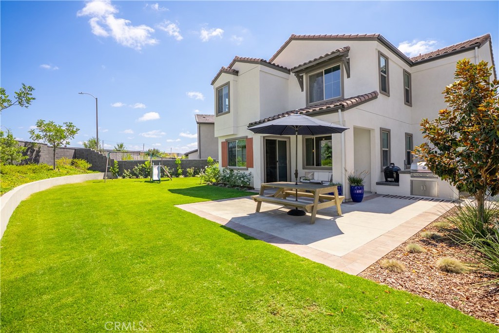 Looking for one of the largest backyards in Botanica? This stunning home is located in the highly desirable Botanica neighborhood within the award-winning community of Rancho Mission Viejo. Ideally located just moments from Boulder Pond, the neighborhood park and playground, and the Ranch Cove amenities. The planned Rienda K–5 School, opening in 2027, will also be nearby bringing added convenience and value to this exceptional home. This expansive backyard offers endless possibilities whether you envision a sparkling pool, a covered cabana with custom features, or the ultimate outdoor entertaining space. A true entertainer’s dream, it’s ready to be transformed into your personal oasis. This home also features its own private driveway, a rare and highly sought-after convenience in Rancho Mission Viejo. Inside, the great room is thoughtfully designed with an ideal layout, providing excellent separation between the living and dining areas, a top preference for today’s buyers. Designed for both lively gatherings and quiet evenings at home, this residence blends comfort and style seamlessly. The chef-inspired kitchen showcases stainless steel appliances, quartz countertops, and generous cabinetry, offering the perfect balance of function and elegance. Upstairs, a versatile loft provides the ideal space for a home office, media room, or second lounge, adaptable to your lifestyle. Sunlight pours through the windows, creating a warm and welcoming ambiance throughout. The primary suite is a true retreat, complete with a spa-like en-suite featuring dual vanities, a walk-in shower, a soaking tub, and an expansive walk-in closet. Other features include: $120,000 in upgrades after purchase, owned SOLAR, custom window coverings, and so much more! Immerse yourself in the exceptional amenities of Rancho Mission Viejo, including the vibrant Ranch Camp, the state-of-the-art Ranch Cove community pool and gym, and countless recreational opportunities that define the unmatched lifestyle of this community. Exclusive to Rancho Mission Viejo residents are all amenities in the Villages of Sendero, Esencia, Rienda and future Villages. There are community amenities for all from breath-taking resort-style pools and spas, Esencia school K-8, community farms, fitness centers, guest house, putting green, bocce ball courts, tennis and pickle ball courts, playgrounds, coffee shop, fire pits, an arcade and so much more!