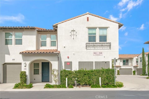 Photo of 318 Trailblaze, Irvine, CA 92618 (MLS # PW26189062)