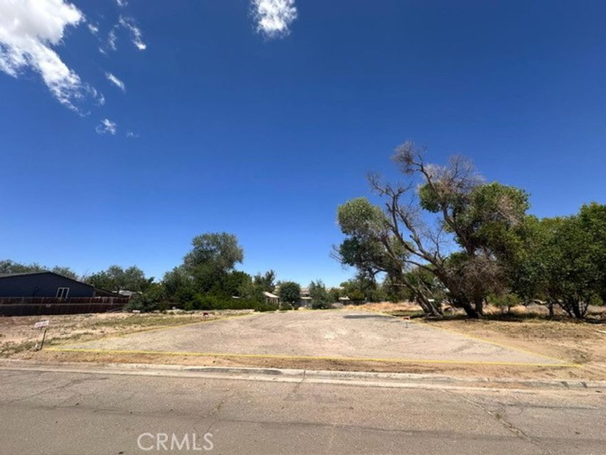 Attention investors and builders! Don’t miss this exceptional opportunity to acquire flat, buildable land in a prime Victorville location. With water, power, and sewer connections readily available at the street, this property is development-ready. Conveniently located near Eva Dell Park, Historic Old Town Victorville, and the California Route 66 Museum, it offers easy access to local amenities and public transportation. A rare chance to invest in a growing area—act now!