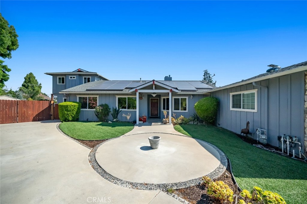 Seize this rare opportunity to own a 5-bedroom, 5-bath Nantucket-style home on a large lot, including a fenced-in 40’ RV hookup pad! A perfect blend of comfort and functionality makes for an amazing, well-sized residence in this highly desirable San Luis Obispo Country Club neighborhood with no HOA. Located on a quiet cul-de-sac near Los Ranchos Elementary and the wine region of Edna Valley, this property offers stunning surroundings and mountain views with a host of premium features that make it truly one of a kind. The main house enjoys both a generous upstairs primary retreat with an ensuite and an additional junior suite on the ground floor.
The backyard includes a spa with a Gazebo/bar, a separate 15’ swim spa pool, and a brick patio, plus a large wood deck for your outdoor entertaining needs. It features new front windows and a one-bedroom, one-bath guest unit with a separate entrance. There’s plenty of parking thanks to ample space in two driveways for up to 6 cars, plus a 2-car garage with 220 electric EV charging available inside or out. This home is far below the current SLO price per square foot, to easily allow remodeling to match your own style while still being clean and move-in ready!