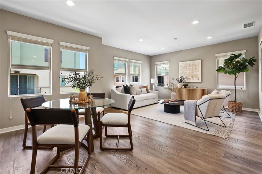 Premium View Location! Discover the many details complimenting the On Trend Design of this Modern 2021 built townhome. Located in the Gated Resort-Style community of Ironridge and featuring 3 Bedrooms + 2.5 Bathrooms this Stylish Residence has everything the Modern Day buyer is looking for! As you step up the entrance stairs to the second floor living area a Light & Bright interior greets you to provide the Perfect Ambiance for your daily routine. The Gourmet Kitchen is the Heart of the Home with a Refreshing Tile Backsplash, Neutral Quartz Countertops, Center Island, Stainless Steel Appliances, and Crisp White Cabinets. The comforts of an Open Concept Living Room are highlighted by an Abundance of Windows and Wood Look Luxury Vinyl Flooring, making this space your very own at home sanctuary. Upstairs you will find 3 Bedrooms and 2 Bathrooms, plus a stackable Laundry Area. Indulge the Comforts of a Calm Atmosphere in your Primary Suite Retreat offering plenty of Space, Natural Light, and Majestic Mountain Views. Continue into the Spa like Master Bathroom including upgraded tile flooring, Quartz Counter tops, Restorative Walk-in Shower, and Dual Vanities. The Outdoor Enclave is a charming sun filled balcony off the kitchen perfect for that morning cup of coffee. Enjoy the benefits of an attached Spacious 2 Car Garage with Epoxy Flooring, an Extended Storage Space, and Tankless Water Heater. The location of this home enjoys easy walking distance access to Exclusive Resort Ironridge amenities including...Parks, Basketball courts, Swimming Pools, Clubhouse, Multiple Picnic Areas, Playgrounds, Walking and Hiking Trails. Gorgeous Home! NO MELLO ROOS! Come see this one in person!