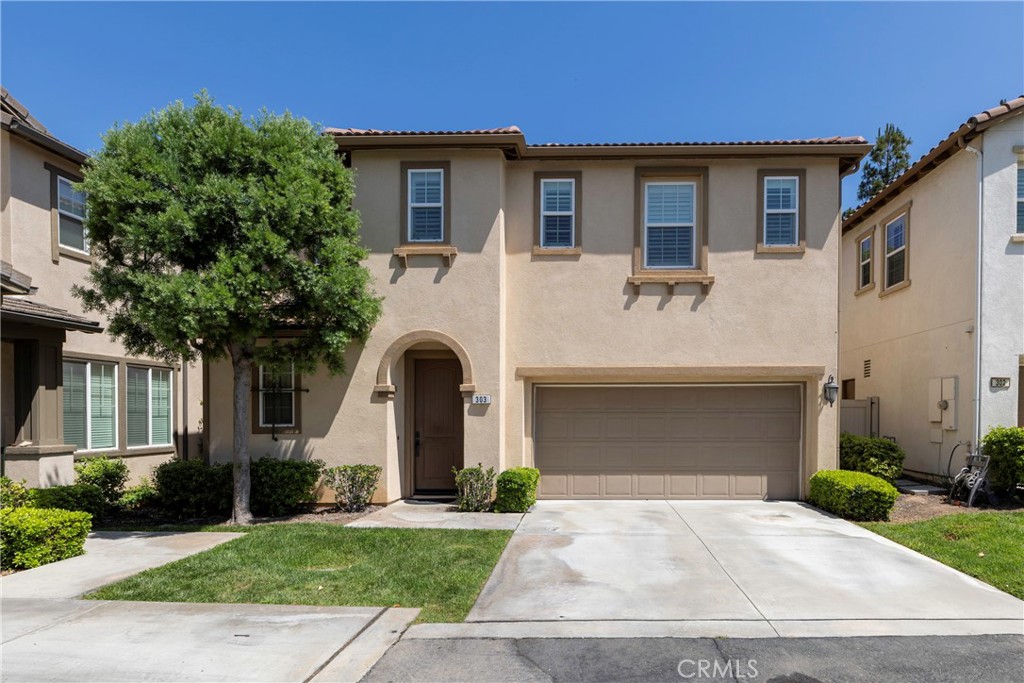 This beautiful modern designed home is in a wonderful location within the popular gated community of "Brio". This planned community is perfect for families due to it's location directly across from the Children's Museum, La Habra Depot Theatre, Tennis Courts and adjacent to Brio Park. This home does back to Brio park so there are no units directly behind the property. The home features over 1800 square feet with 3 bedrooms upstairs including a large primary bedroom and bathroom suite with walk-in closet. The kitchen area is expansive with plenty of room for dining with large family gatherings. Typically in a planned community the patio area is small but this property offers a generous backyard space with plenty of room for entertaining or simply relaxing. Inside the home there is an abundance of natural light due to the high ceilings and multitude of windows. The home has been maintained very well by the original owner and recently the primary shower was remodeled and a new dishwasher installed. This is a great value when you consider the size and age of the home along with the amenities close by.