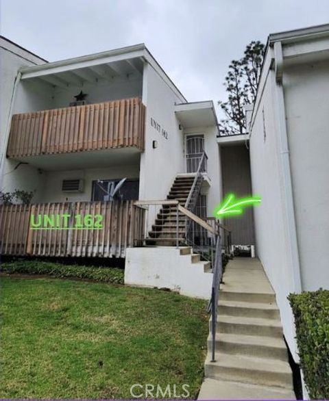 Photo of 1661 Neil Armstrong St, Montebello, CA 90640 (MLS # DW26110584)